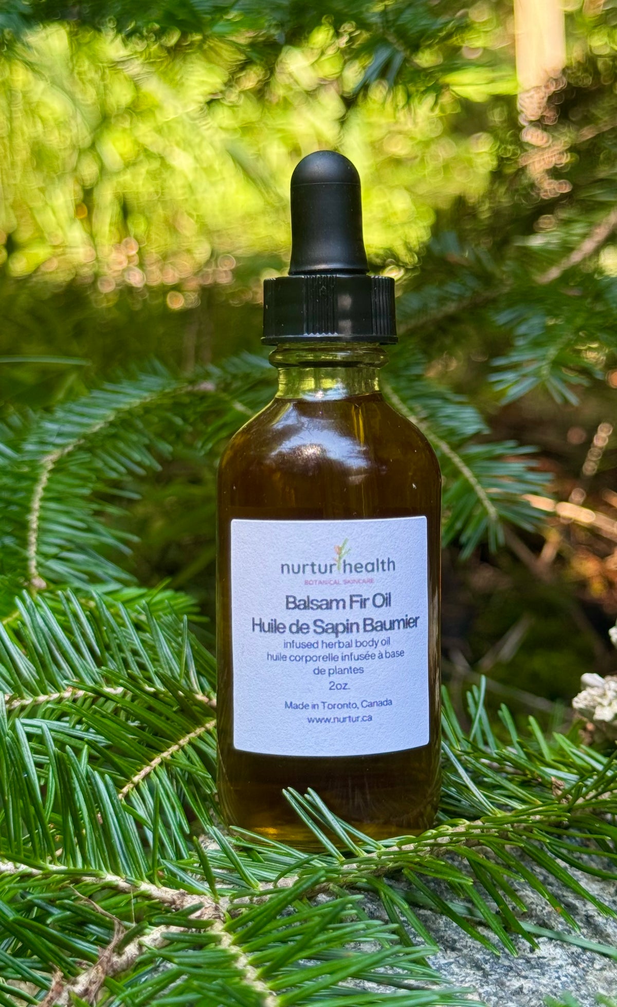 Bottle of balsam fir infused oil