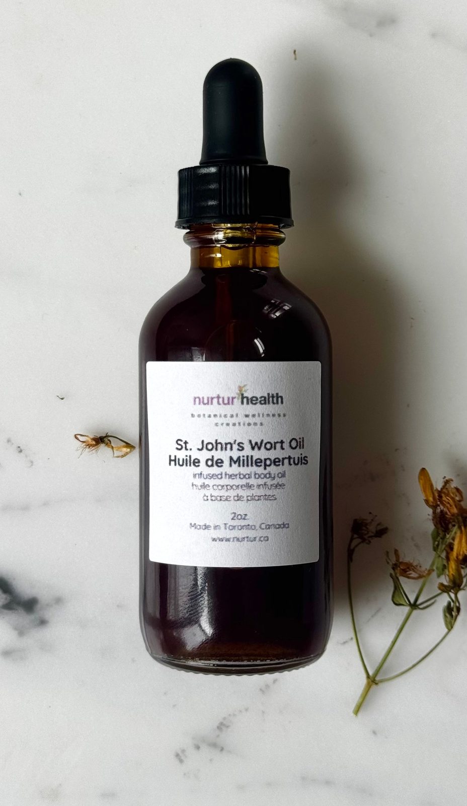 St John's Wort infused oil, deep wine-red